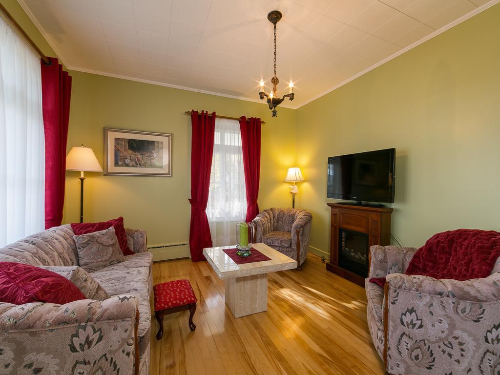 Auberge Gite Maison Des Lilas La Malbaie Rom bilde